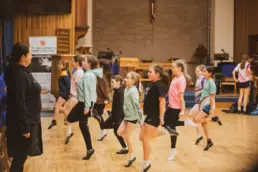 Children practising Irish dancing during a weekly class in the church hall at St Columba’s Derryvolgie in Lisburn