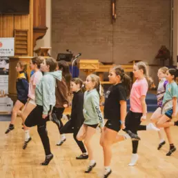 Children practising Irish dancing during a weekly class in the church hall at St Columba’s Derryvolgie in Lisburn