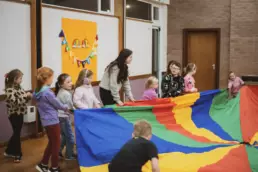 Children taking part in games and activities during a Bible Club session at Derryvolgie Church, Lisburn.