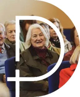 Congregation members listening attentively during a Sunday worship service at Derryvolgie Church in Lisburn.